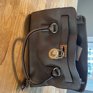 Genuine Michael Kors bag. Light tan with gold chain strap